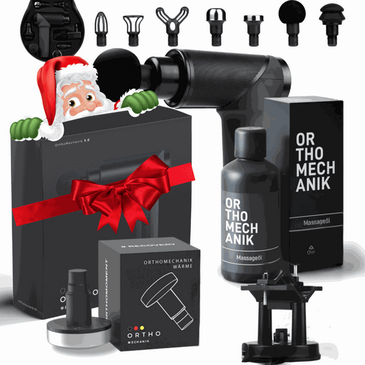 OrthoMechanik 3.0 Weihnachtsedition massage set with accessories and festive packaging.